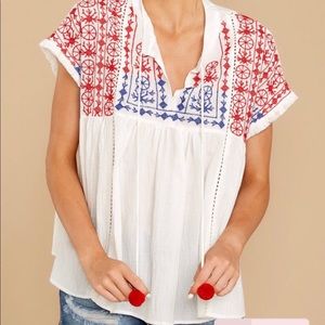 White Top with Blue and Red Embroidery